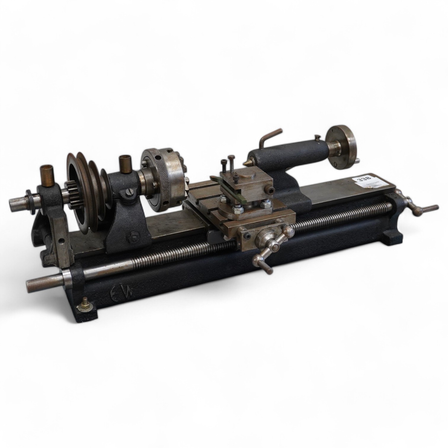 A model engineering workshop lathe, by E.W. Stringer, length 60cm. Condition - fair, some surface rust.